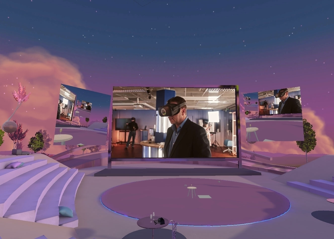 Lilac amphitheater in a virtual reality environment AltspaceVR. There is a big screen in the middle, with a photo of a person vearing a VR headset.