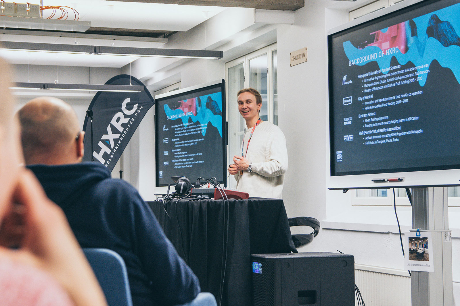 Helsinki XR Center's XR Curator Santeri Suominen introducing Helsinki XR Center to incoming hub teams.