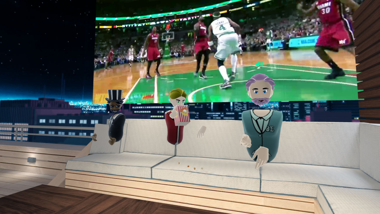 A screenshot of BigscreenVR. Three participants are sitting on a white couch in front of a screen with a basketball game on. It's night time and they are outside on a rooftop balcony. The participant in the middle is eating popcorn.