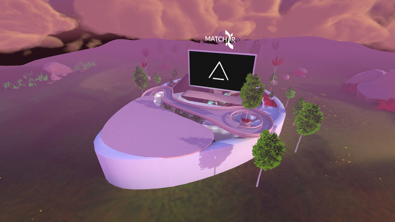 AlspaceVR screenshot of the Aurora Amphitheatre. An oval strucure with a big screen.