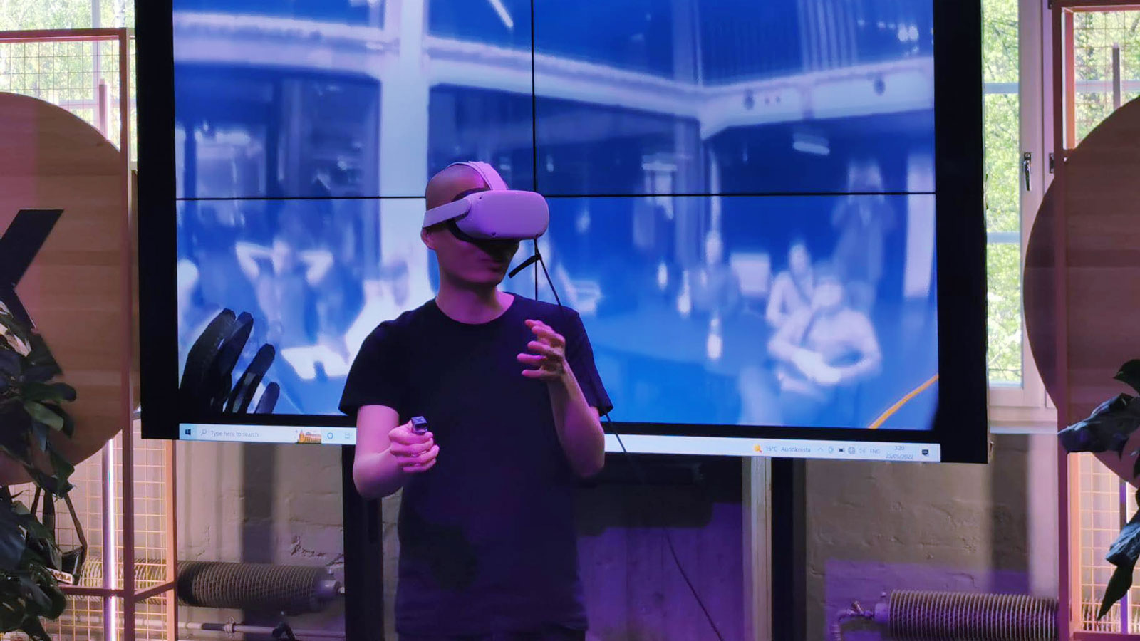 Atelier team member in a VR headset