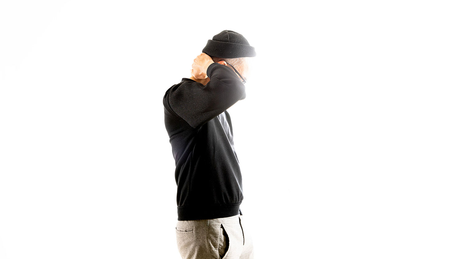 Timo Wright from Cinema Vrerite standing in front of a white background. Photo by Riitta Supperi.